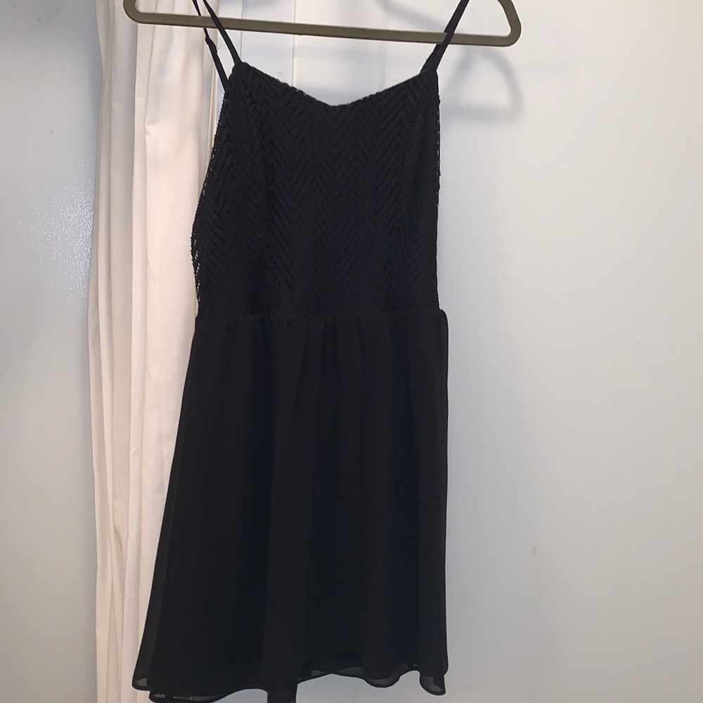 Short black dress with lace